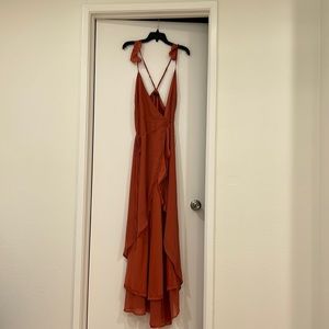 Lulu’s Here’s To Us high-low wrap dress in Rose.